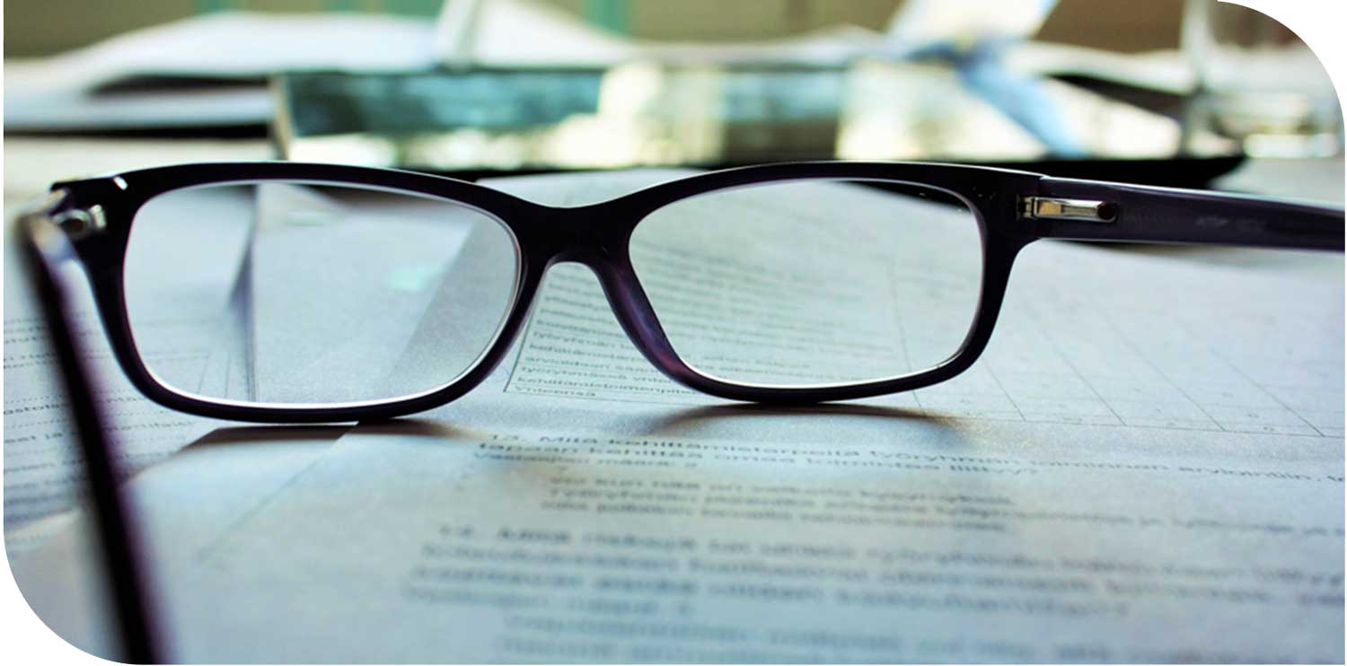 picture of documents and glasses
